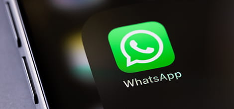 WhatsApp logo and icon on phone